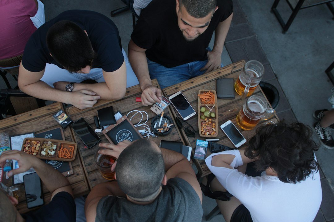 group of friends discussing politics on phones